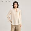 Qianqian grammar style irregular V-neck small shirt 2026 spring new commuting design sense ribbon hollow top for women
