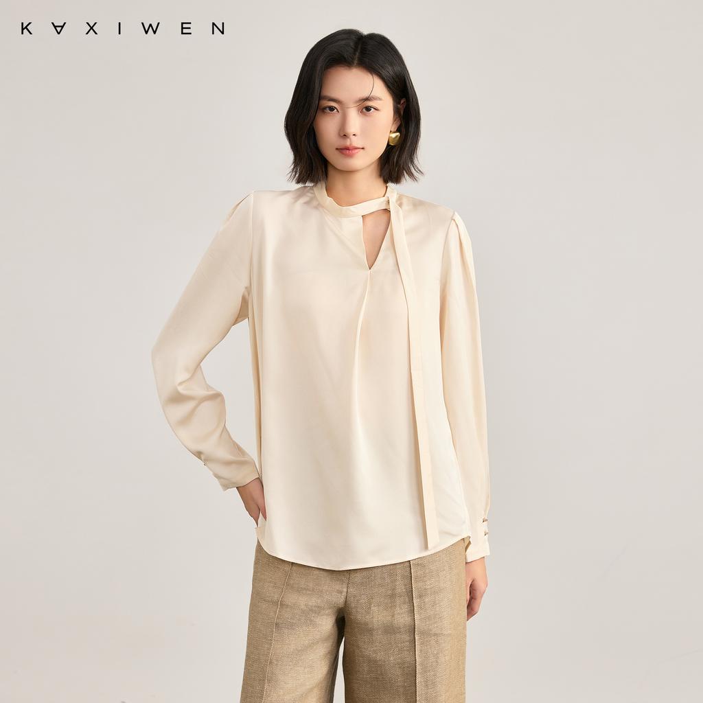 Qianqian grammar style irregular V-neck small shirt 2026 spring new commuting design sense ribbon hollow top for women