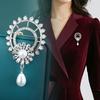 Suit brooch high-end light luxury Ferris wheel niche corsage pin hanging beads with jewelry