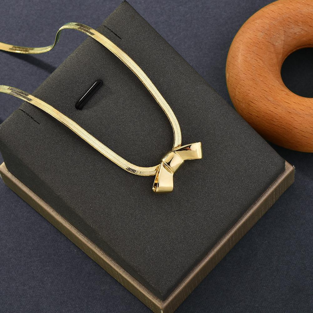 Элегантное ожерелье из титановой стали с узлом-бабочкой и премиальной золотой отделкой для женщин