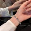 Изысканный браслет из циркония с ажурной резкой - Элегантный осенне-зимний аксессуар с уникальным стилем для женщин