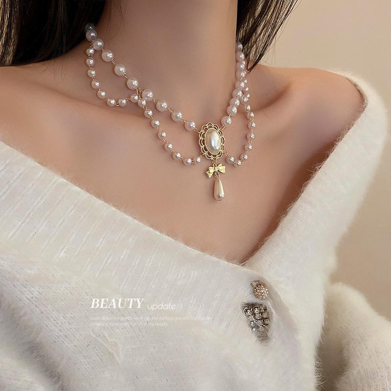 Korean temperament love butterfly pearl fringed necklace fashion collarbone chain versatile item decoration