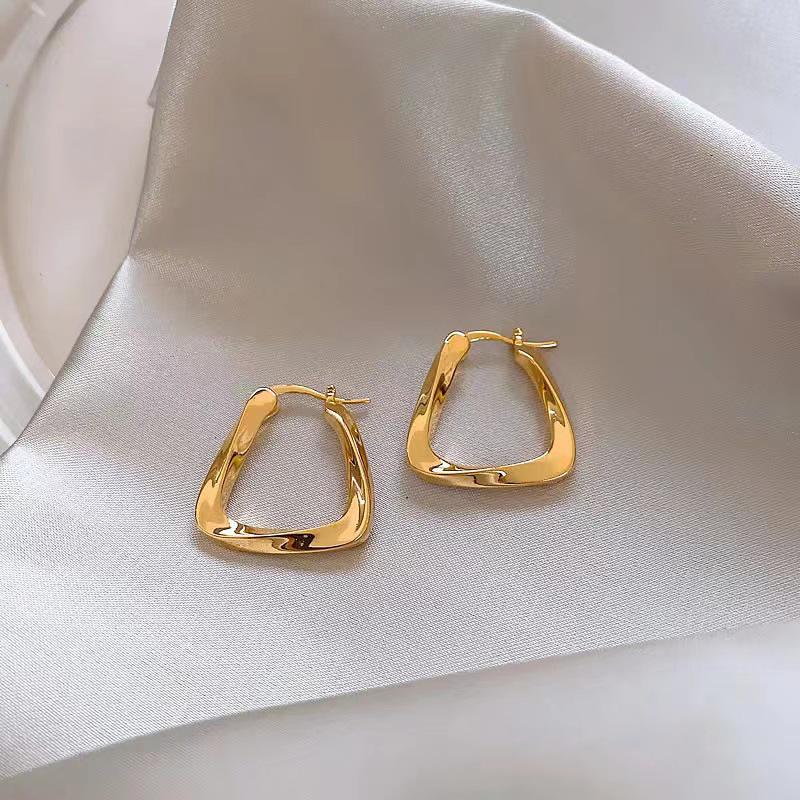 Европейские и американские классические ретро-серьги из металла для женщин - шикарный холодный стиль, элитные ювелирные изделия знаменитостей