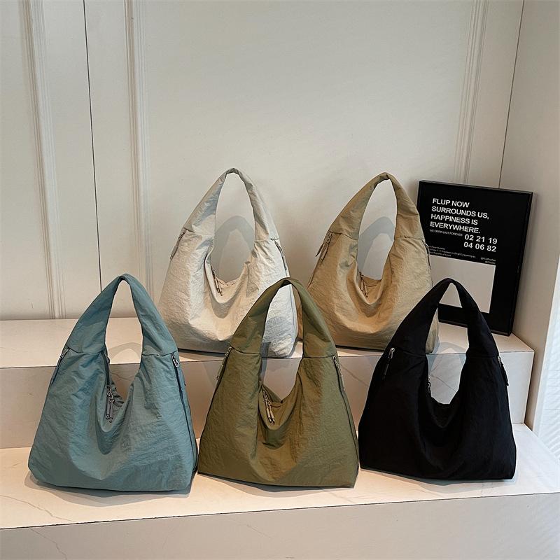 Japanese fashion casual tote bag women's 2026 autumn new large-capacity armpit bag commuter shoulder bag