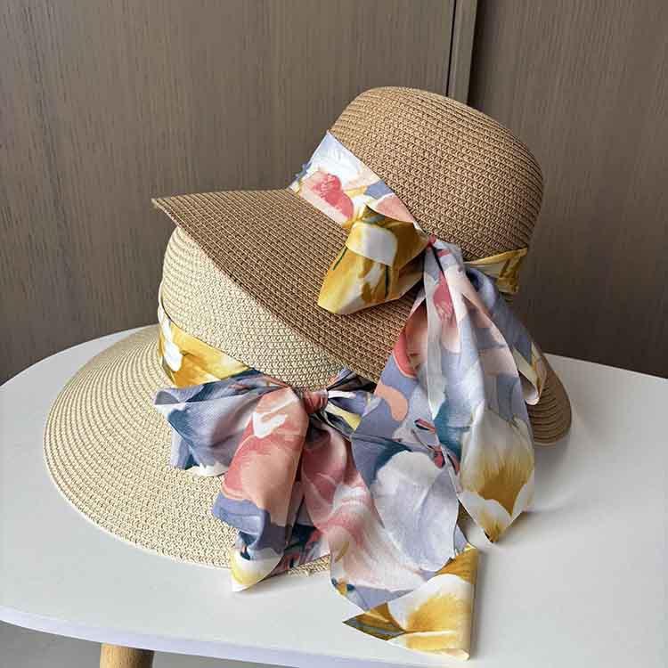 Summer small fresh streamer bow woven straw hat women's big eaves sunshade sunscreen hat seaside vacation sun hat