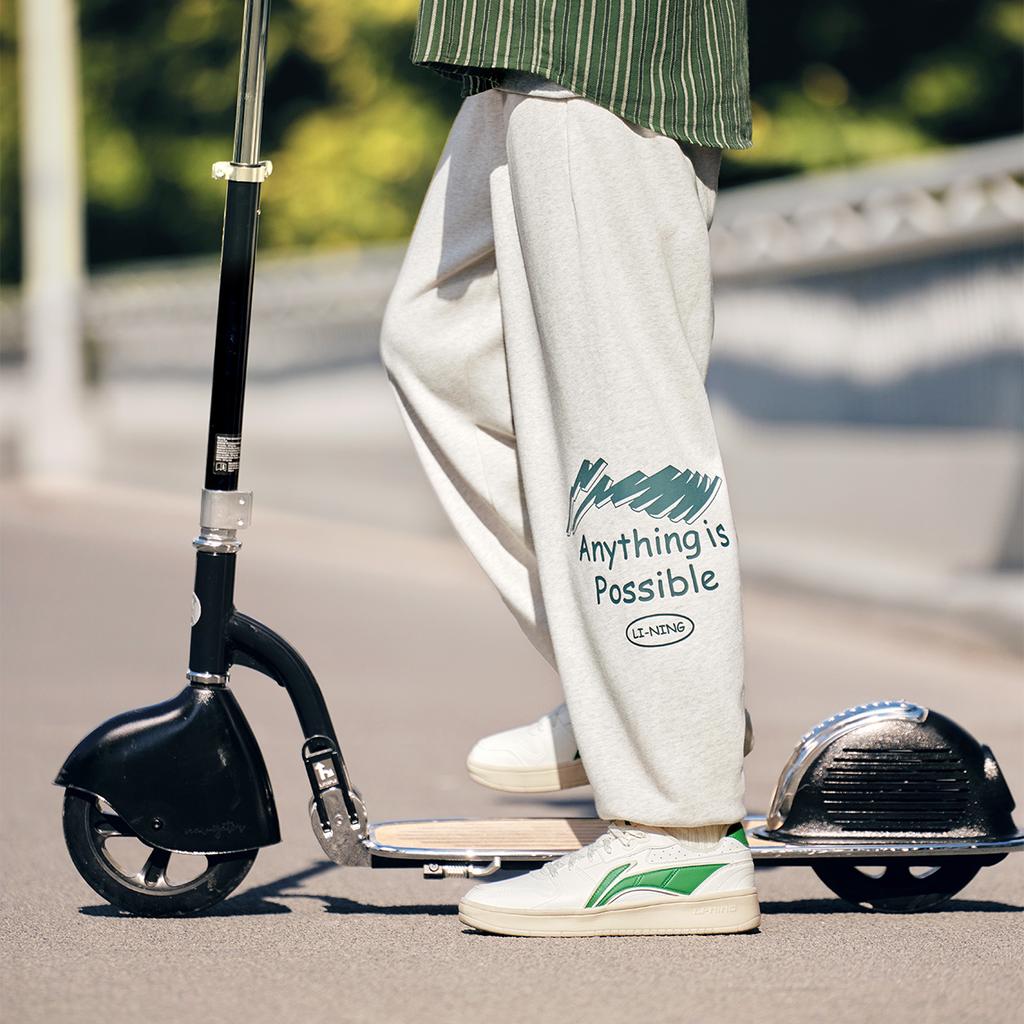 Li Ning Sports Lifestyle Series Letter Fleece Loose Warm Warm Wristaled Knitted Sweatpants Mens pants Flower-Gray Tile-Gray AKLU921-2