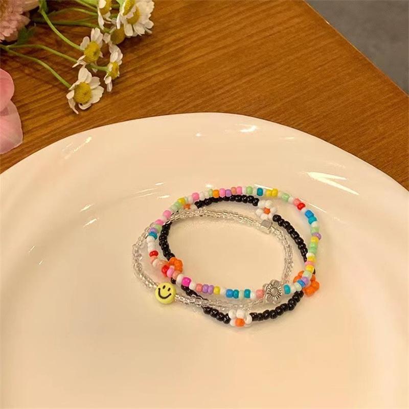 Браслет из бисера «Цветок-смайлик»