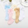 Носочки гольфы для маленькой девочки. Ткань дышащая, цвета нежные, украшены бантиком из ленты