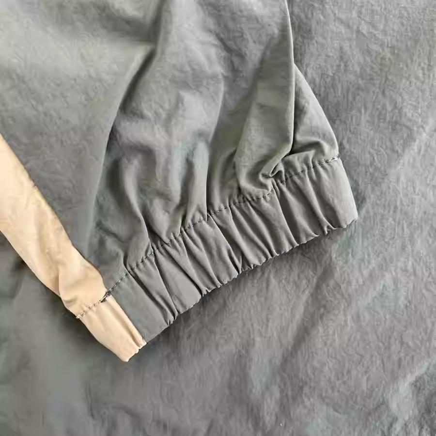 New Balance Куртки Унисекс Зеленые С воротником-стойкой Умеренные Рабочая одежда NAA56143-KH