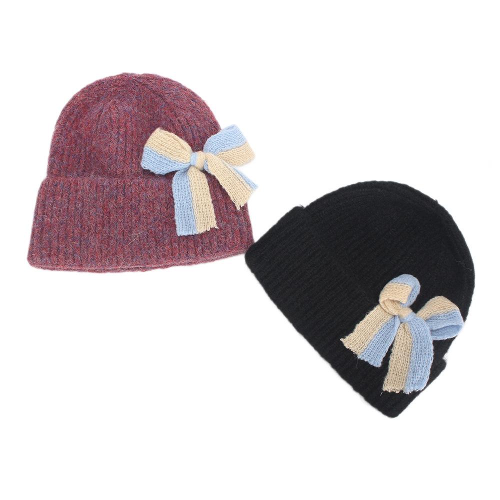 A Douyin hot-selling cute bow warm knitted hat wool hat women's flanged fashion windproof hat