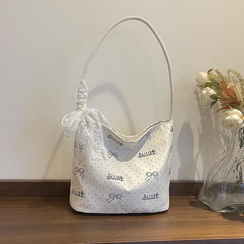 Нишевая сумка в горошек женская новая универсальная на плечо под мышку для выхода на работу сумка-ведро маленькая сумка