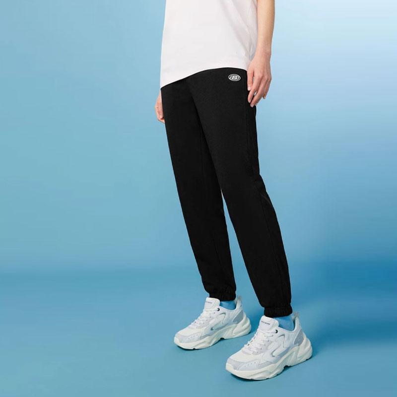 Skechers Однотонные спортивные брюки с шнуровкой и манжетами для улицы, вязаные, женские, низ, угольно-черные L224W051-0018