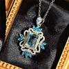 Huitan Bohemia Style Blue Cubic Zirconia Pendant Necklace for Women Hollow Out Flower Design Temperament Wedding Party Zircon
