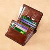 Genuine Leather Ultra-Thin Men's Multi-Function Short Wallet with Driver's License Holder and Anti-Theft Design.