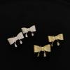 Small Bow  Trendy Hepburn Style Niche Earrings  Hong Kong Style Matte Metal High-end Texture Earrings
