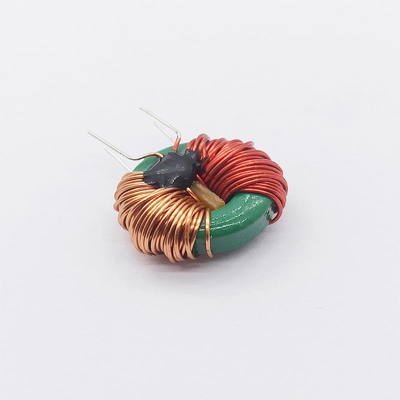 Common Mode Choke Inductor, T12x6x4, 0.35 Wire, Red Bobbin, Split Winding 20mH 2A, with Magnetic Core and Central Partition.