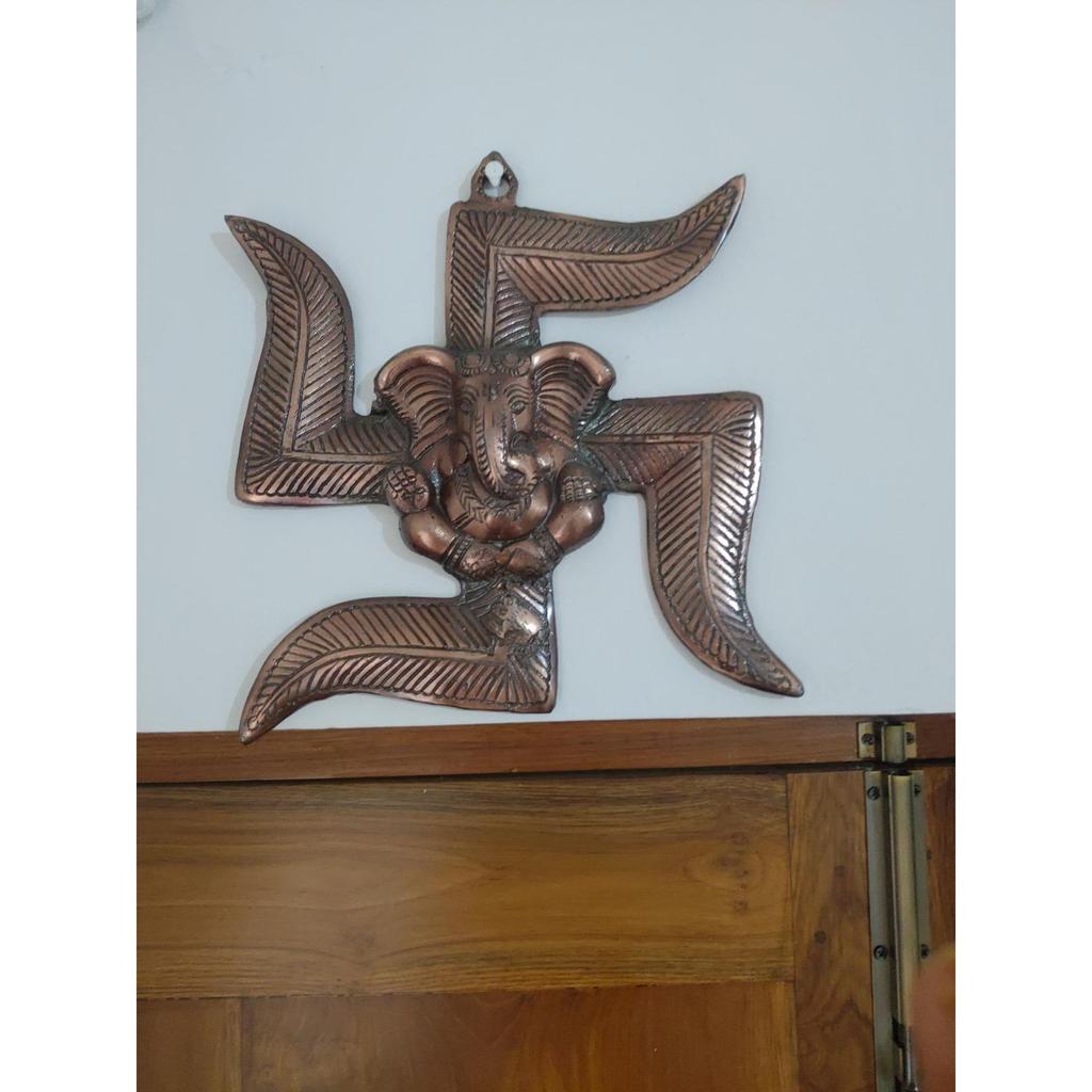 Lord Ganesha On Swastik Metal Wall Hanging (22 Cm X 3 Cm X 24 Cm, Brown)