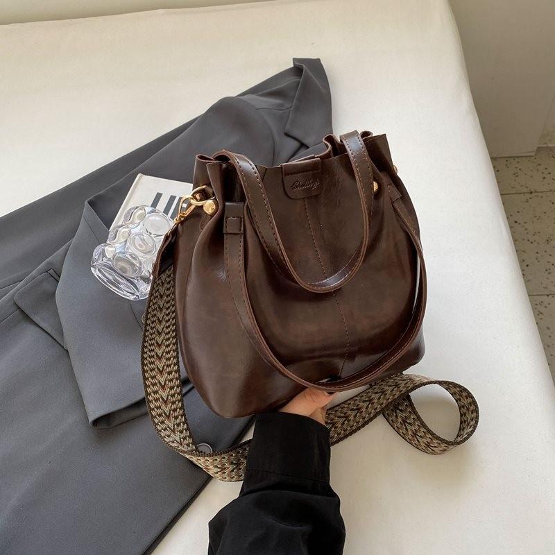 Стильная сумка-ведро для женщин, мягкая сумка через плечо из искусственной кожи, трендовых черного, коричневого, хаки и кремового цветов, идеально подходит для повседневного использования