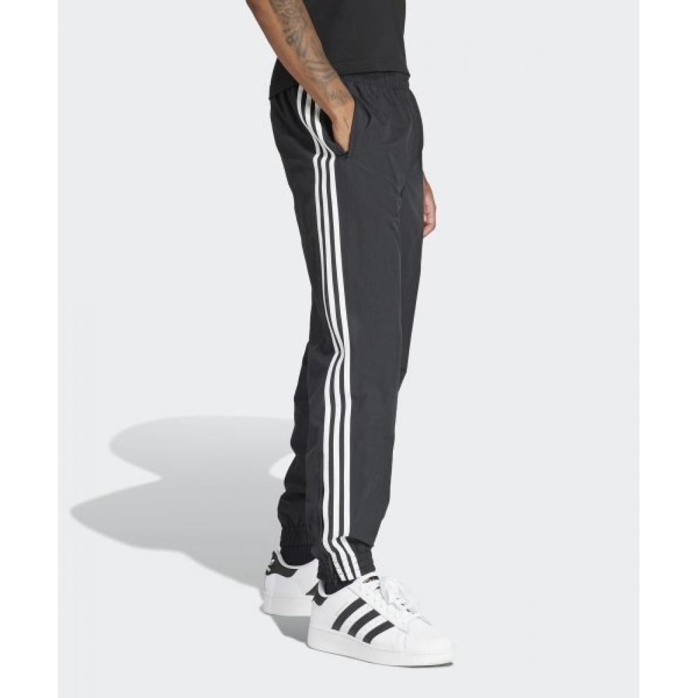 adidas Тканые спортивные штаны Firebird черного цвета It2501