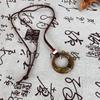 «Ожерелье с подвеской в виде черного веревочного кольца в этническом стиле — новый китайский дизайн для осени и зимы»