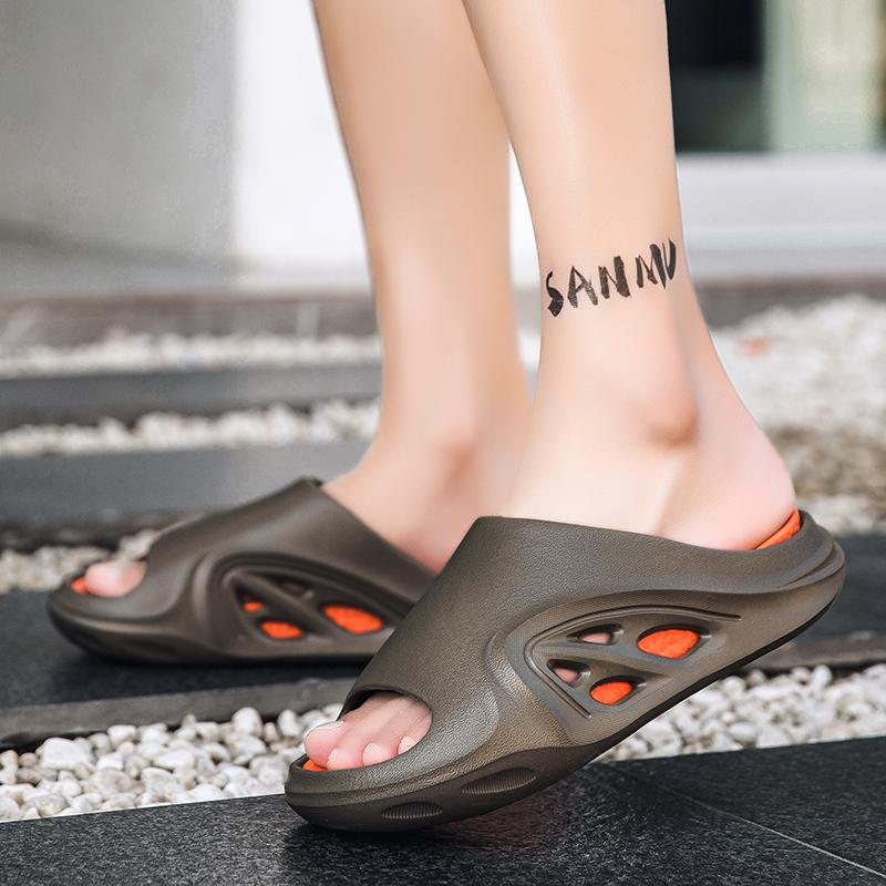 Мода 2025 Мужские роскошные домашние тапочки Летние новые мужские тапочки на толстой подошве для улицы Перфорированная пляжная обувь Ленивые кроссовки Крутые тапочки