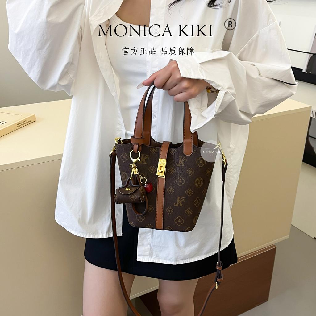 European and American trendy high-end sense retro printing portable bucket bag women's 2025 new large-capacity fashion versatile messenger bag