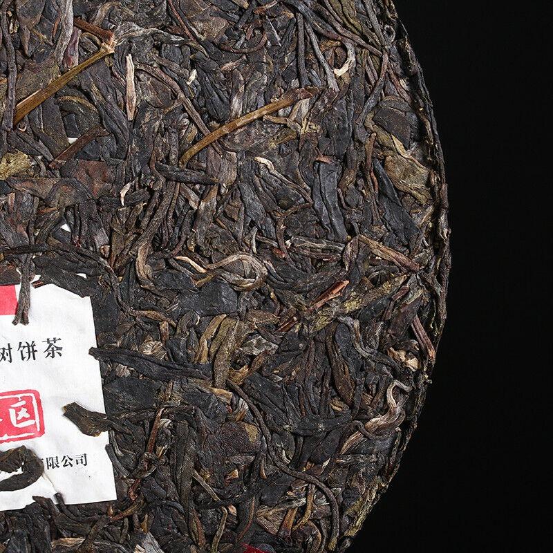 Yiwu Green Big Tree XY Сягуань Пуэр Юньнань Пуэр Железный чайный торт сырой 357г