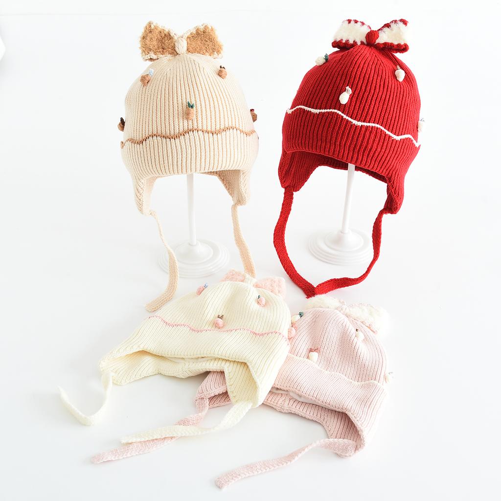Winter children's hats, girls' outdoor sun shading and windproof woolen hats, baby knitted bow ear protection hats