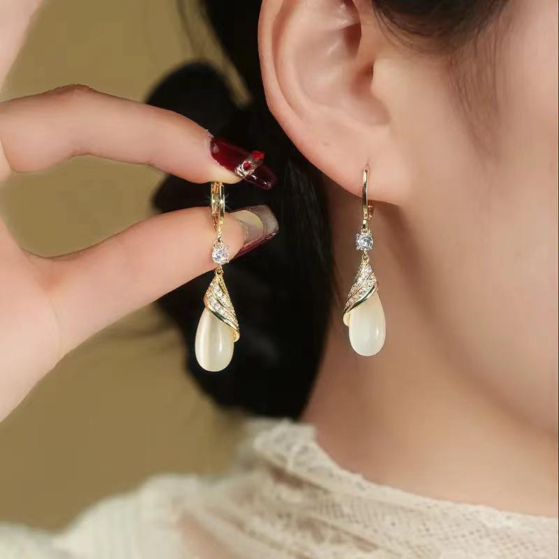 2024 Шикарные геометрические серьги кошачий глаз с бриллиантами - Легкий роскошный модный дизайн