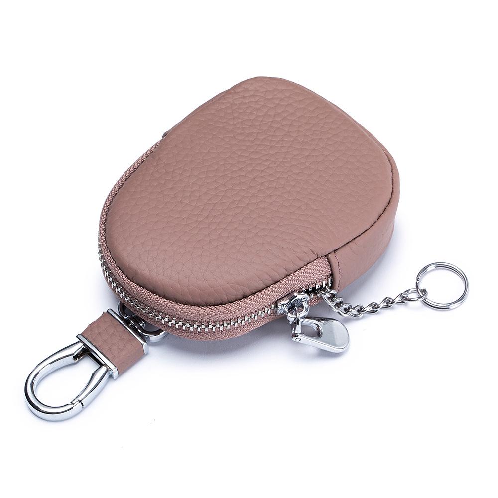 Genuine Leather Mini Coin Purse & Key Holder: Multifunctional Cowhide Wallet & Earphone Bag.