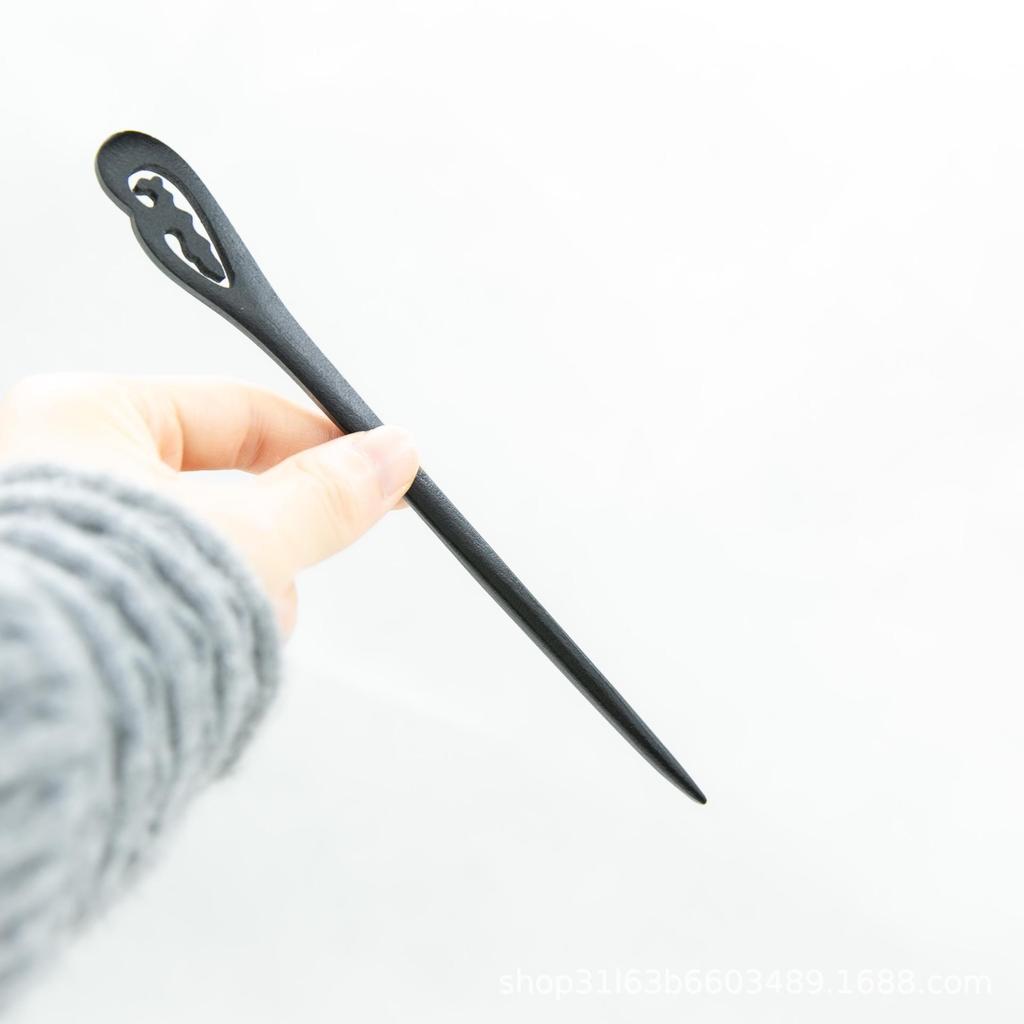 Элегантная шпилька из черного дерева: Современная простота в сочетании с древним китайским стилем