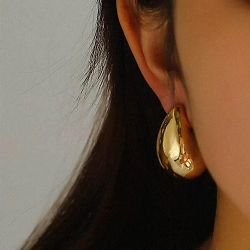 Exaggerated Titanium Steel Water Drop Earrings for Women - Fashionable and Versatile Hollow Stainless Steel Design.