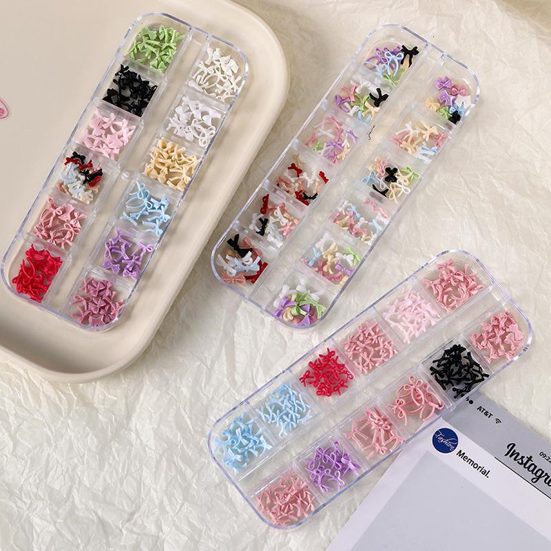 12 Grid Multiple Colors Bowknots Nail Art Charms Mini Adorable Line Bows Ties Resin Nail Decorations For Diy Earring Nail Suppli
