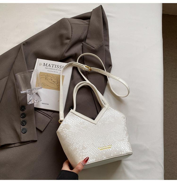 Нишевая дизайнерская сумка женская новая высококлассная ретро сумка через плечо, сумка-мессенджер, портативная сумка-ведро для поездок