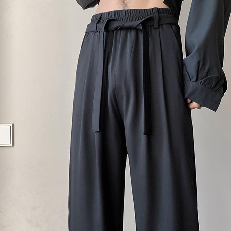 Брюки из итальянского драпированного ледяного шелка в стиле британских яппи с завязками