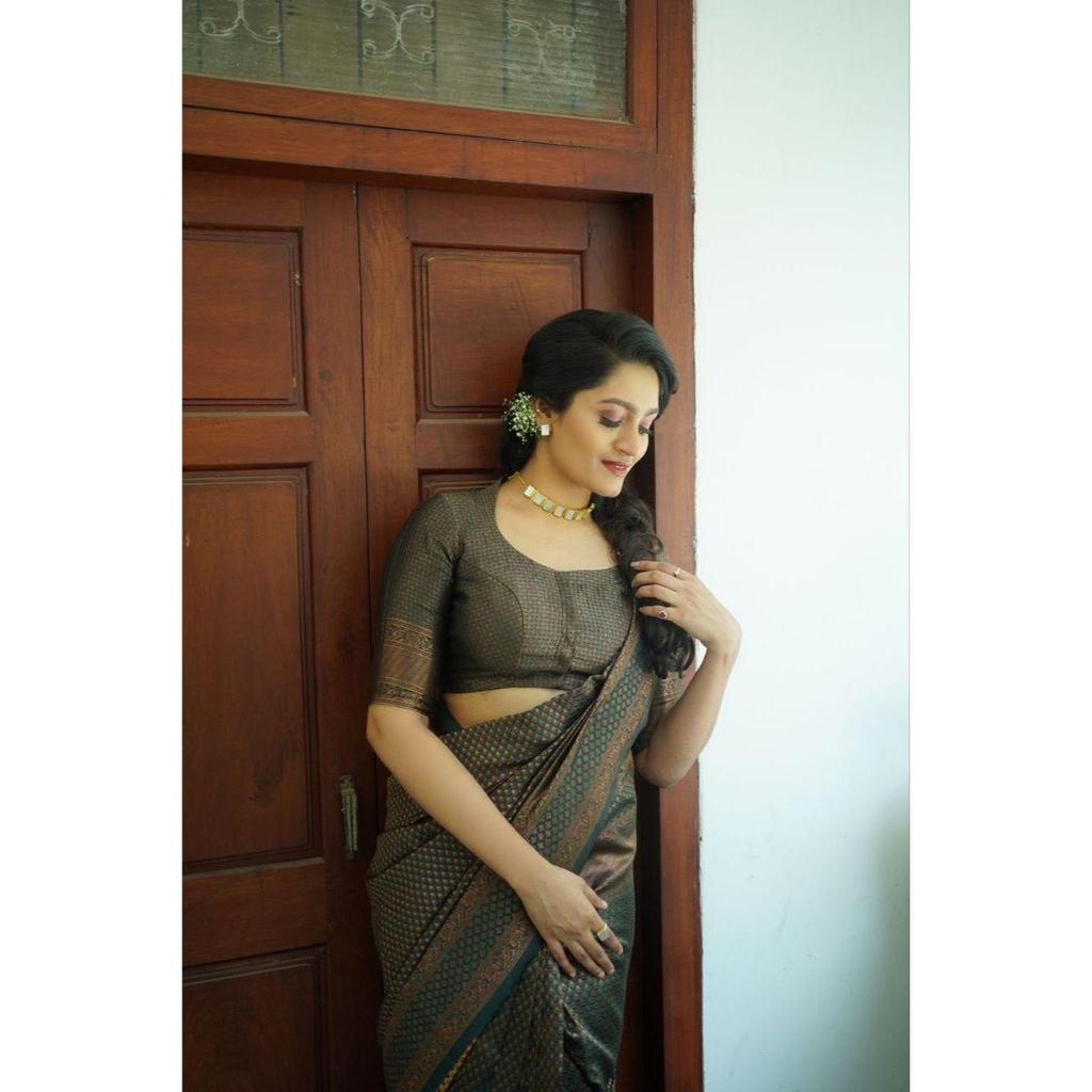 Silk Saree from the ALMAARI Store Is Adorned with Beautiful Zari Work In Form of Traditional Motifs.