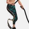 Under Armour Project Rock Printed Compression Capri Брюки женские низы бирюзовый 1377954-722