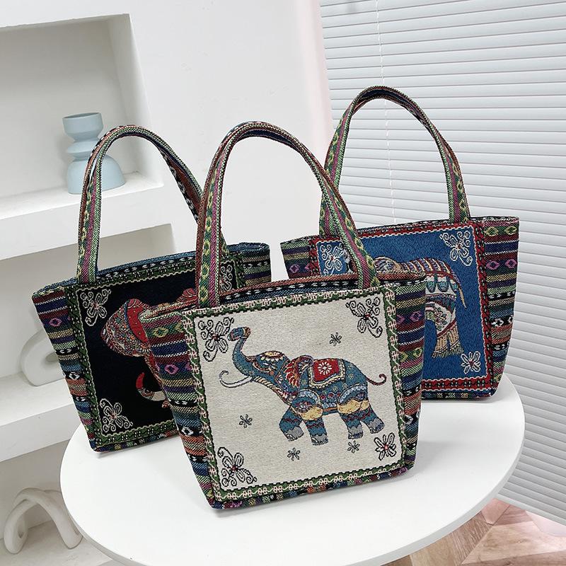 The Elephant Embroidery Double-sided Hand Shoulder Bag Is Versatile with Jacquard Patterns
