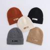 Осенние и зимние шапки женские плюшевые новые вязаные шапки универсальные теплые защитные наушники шерстяные утолщенные модные студенческие шапки