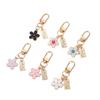 1Pcs Korean Hot-Selling Ins Metal Style Daisy Keychain Niche Usb Headphone Pendant Bag Protective Cover Pendant