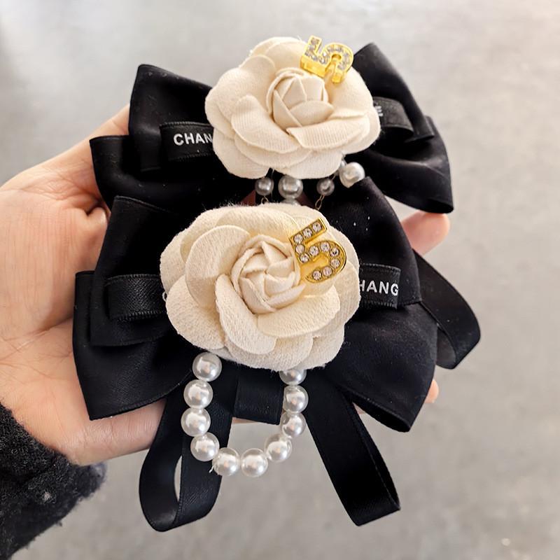 Modern Pearl Floral Pin With Butterfly Knot Design For Adult Formal Wear