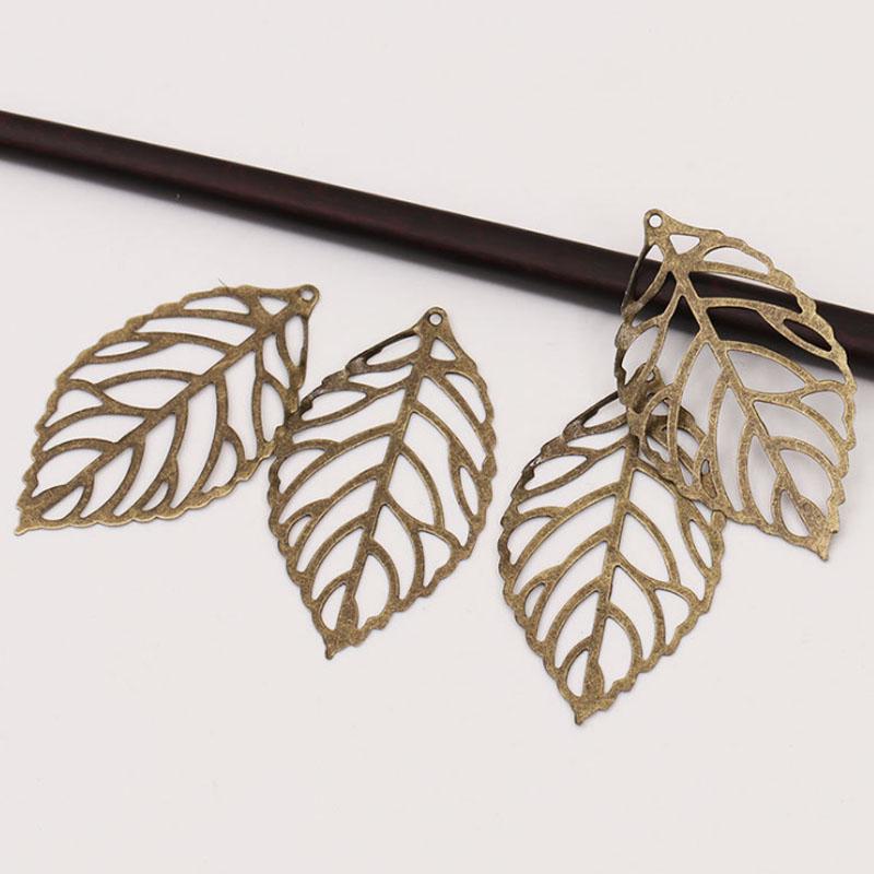 Товары для домашней вечеринки Изготовление ювелирных изделий Винтаж Ретро с покрытием DIY Золотой Шарм Филигрань 50 шт. Ювелирные аксессуары Полые листья Подвеска Ремесло