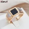 Золотые кольца Kinel с черным камнем и посеребрением
