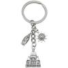 Ancient Silver Castle Sun Statue Zinc Alloy Keychain - Creative Backpack Accessory and Commemorative Pendant.