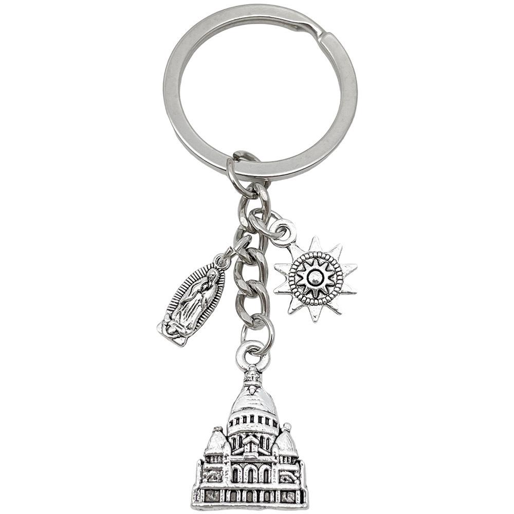 Ancient Silver Castle Sun Statue Zinc Alloy Keychain - Creative Backpack Accessory and Commemorative Pendant.