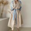 Women's Korean Chic Retro Trench Coat with French Lapel, Color-Contrast Stitching, and Lace Waist Trim.