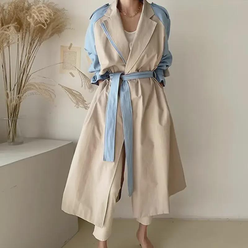 Women's Korean Chic Retro Trench Coat with French Lapel, Color-Contrast Stitching, and Lace Waist Trim.