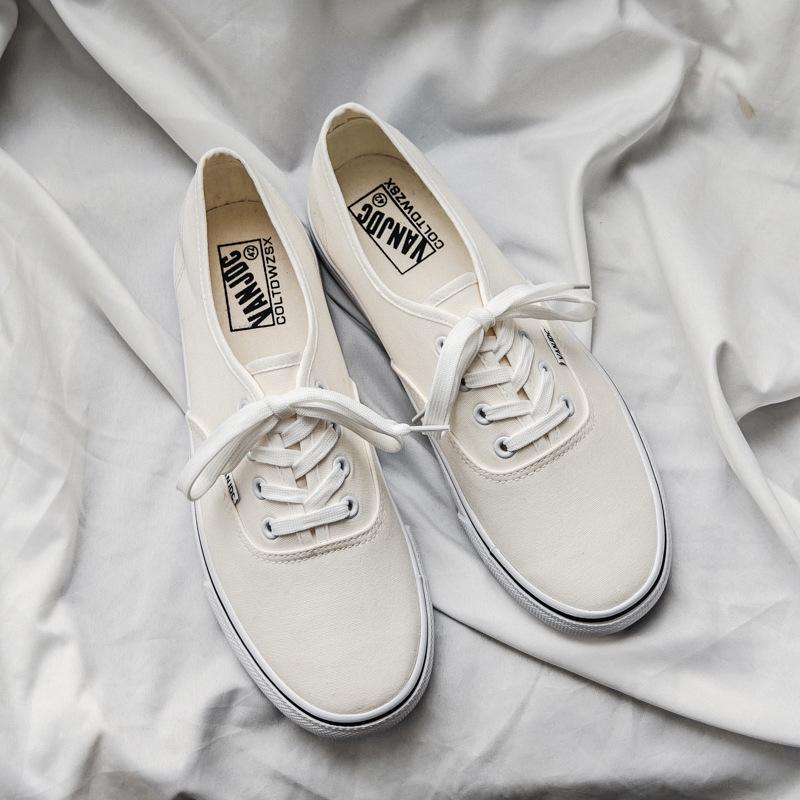 "Douchuan 2025 Весна/Осень Модные низкие парусиновые кроссовки для мужчин: Универсальная повседневная обувь для пар и студентов.