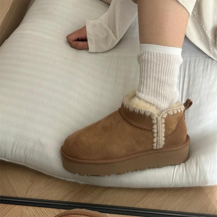 Thick-soled sheepskin integrated snow boots women's autumn and winter piled thickened warm women's boots