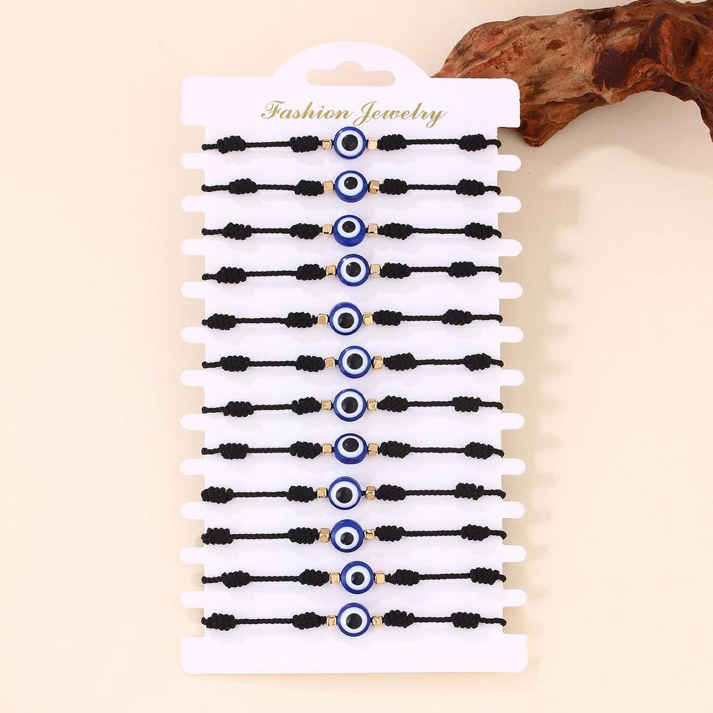 Набор браслетов из красной нити с синим сглазом - Ручная работа, плетеный дизайн